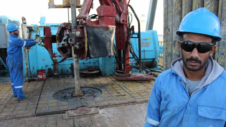 File photo: An oil worker in the south of Libya photographed in 2014. 